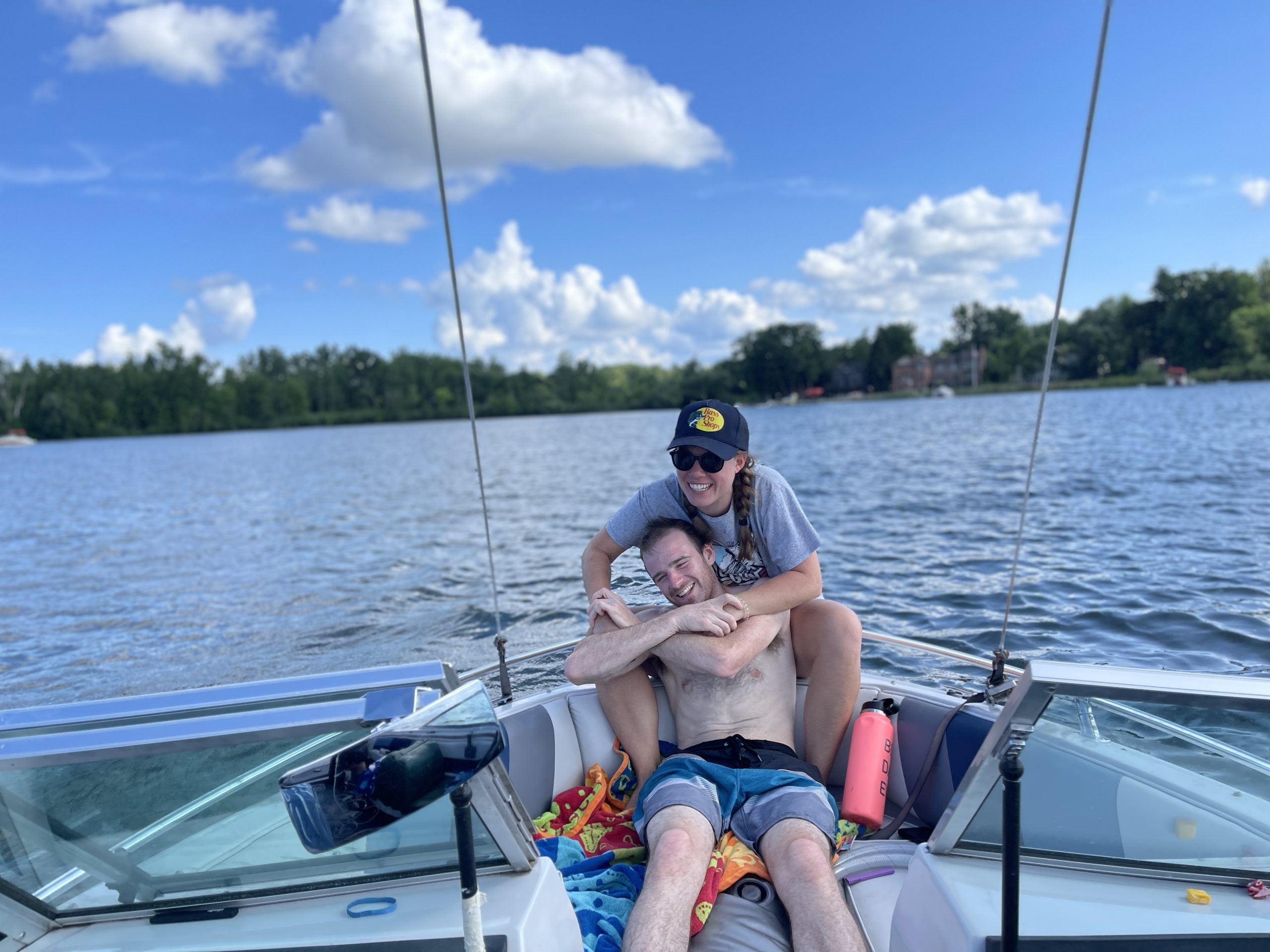Couple smiling by a lake